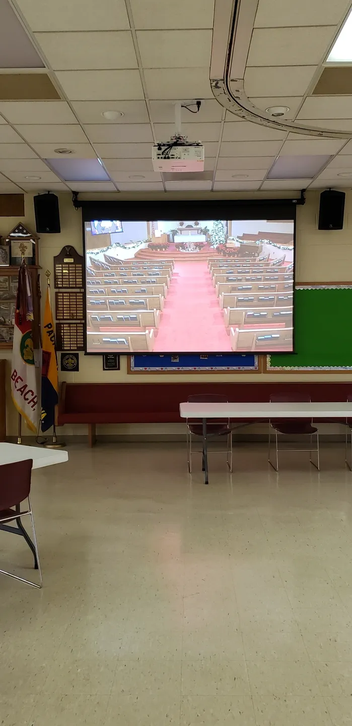 A large screen in the middle of a room.