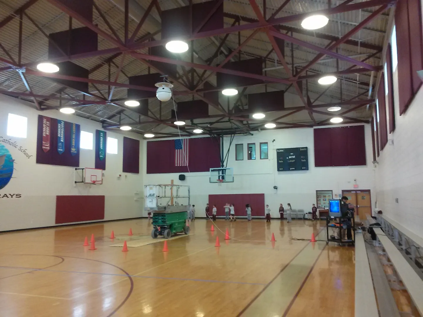 A gym with many cones on the floor