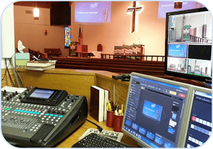 Church sound and video control booth setup.